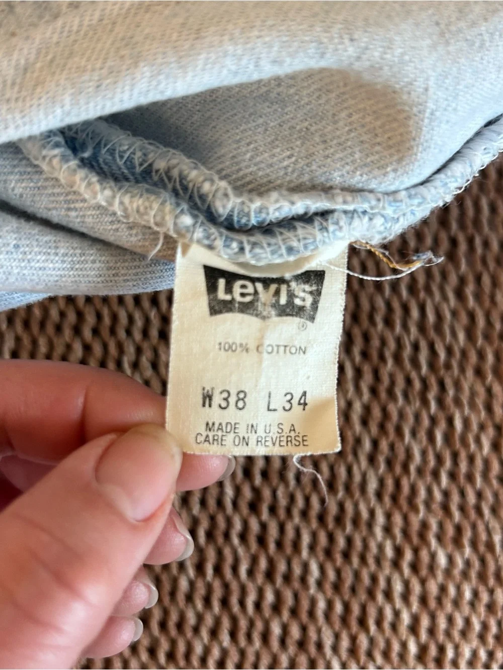 Vintage 1993 men's Levi's 501 light blue denim jeans with leather patch 38×34